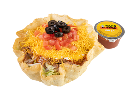 A taco salad with olives and cheese on top.