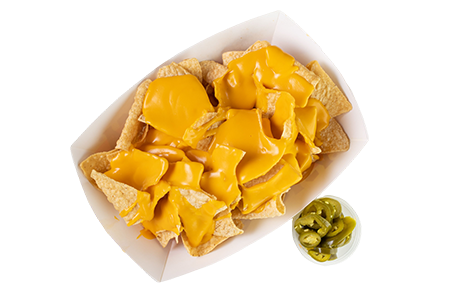 A plate of nachos with cheese and jalapenos.