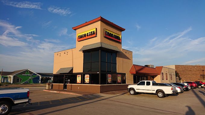 A truck parked in front of a building.